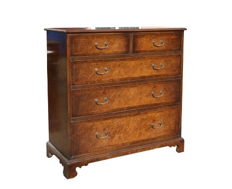 A burr walnut chest of two short and three long graduated drawers, on bracket feet, 102cms (40ins) wide.