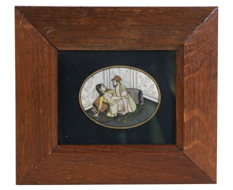An Indian school oval erotic scene portrait miniature, 6cms (2.25ins) wide, framed &amp; glazed.