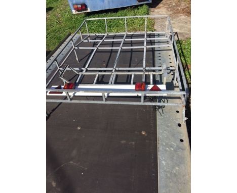 A Land Rover 90 roof rack, ladder and lighting board