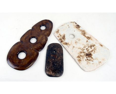 A group of three Chinese jade / hardstone implements (Celt), largest 30cms (12ins) long.