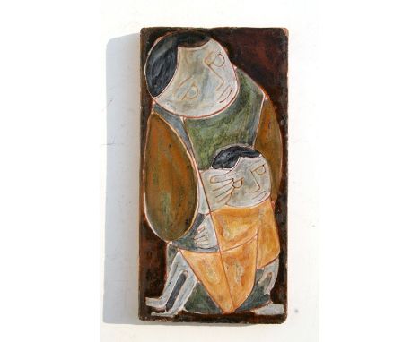 A South American glazed pottery tile depicting a Mother &amp; Child, by 10.5 by 22cms (4.25 by 8.5ins).