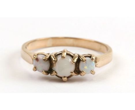 A 9ct gold three-stone opal ring, approx UK size 'S'.Condition ReportSetting dirty, no cracks to the opals, shank worn a litt