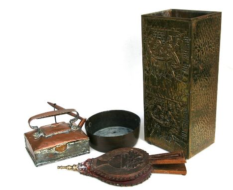 A Victorian copper kettle; together with a copper saucepan; a brass stick stand; and a pair of oak bellows (4).