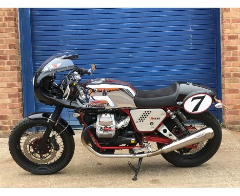 A 2011 V7 750cc Café Racer (limited edition anniversary model No. 982), registration number EK61 BVC, chrome. Produced to com