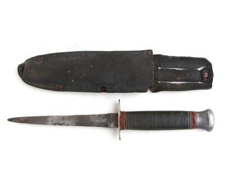 A William Rogers / Sykes Fairburn style Commando dagger in a leather sheath, 27.5cms (10.5ins) long.
