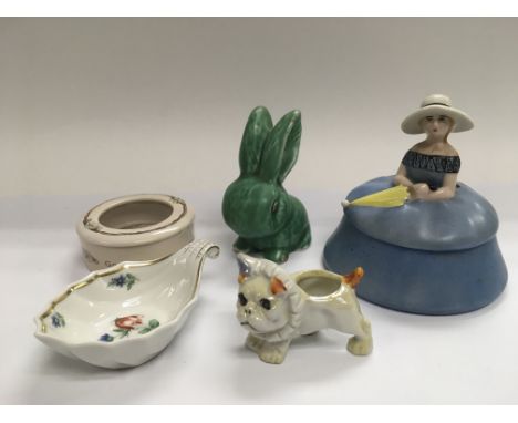 Five small ceramic items including a Wade rabbit and other items.