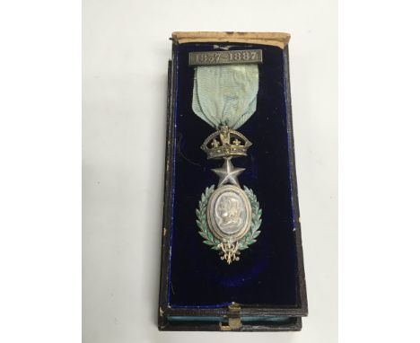 A Victorian Masonic commemorative medallion, blue enamel on silver.
