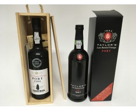 A bottle of vintage 1986 (bottled in 1990) Sandeman Port and a bottle of Taylors 1987 Port in boxes. 75cl - NO RESERVE