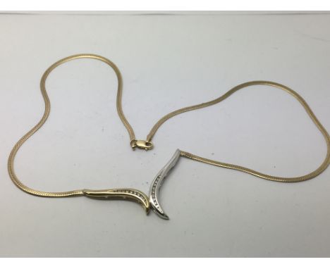 A ladies white and yellow gold necklace set with diamonds, approx 6.4g.