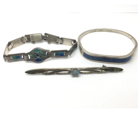 A silver and enamelled bracelet plus one other and an open doublet brooch set with an opal (3).