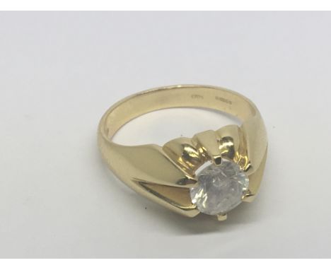 An 18carat yellow gold gypsy type ring set with a brilliant cut solitaire diamond 0.72 carat. Ring size S weight 8g.