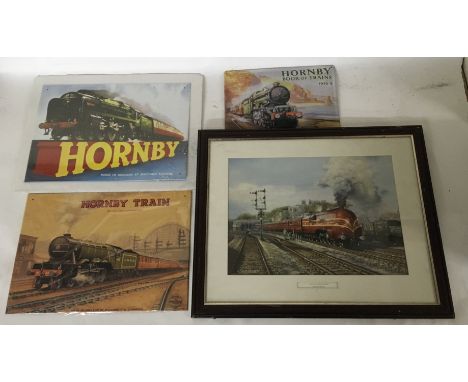 A group of framed railroad prints and steel wall plaques, including Hornby examples.