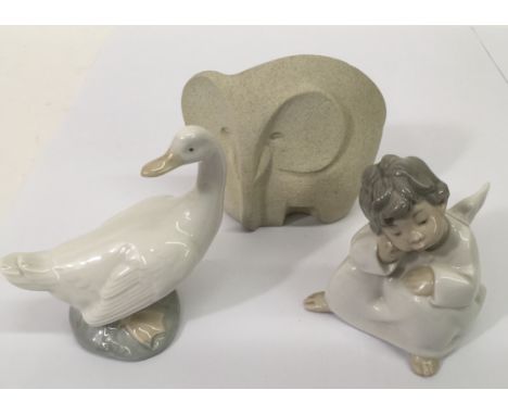 A Lladro cherub, Nao duck and Marbell elephant