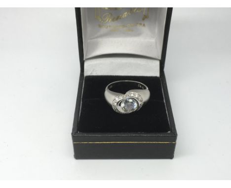 A silver and CZ ring, approx 4.8g and approx size N - NO RESERVE