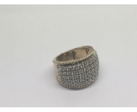 A gold 9carat Bombay ring set with five rows of brilliant cut diamonds. ring size M.