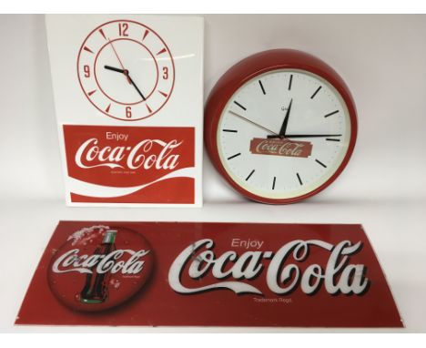 A plastic Coco Cola shop sign, Coco Cola clock with later quarter movement and a metal circular Coke clock with 240 volt move