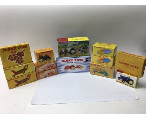 A group of 13 boxed Dinky farming equipment toys, to include two harvest trailers #320, two triple gang mower #323, two #344 