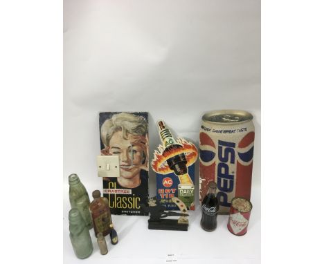 A small group of vintage advertising items including Cola and 'Felix the Cat'
