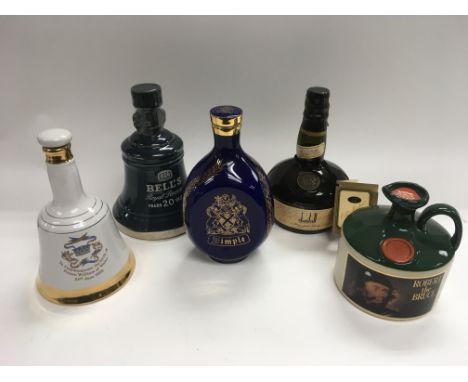 Five bottles of Whisky including a 75cl bottle of Dimple Haig, Bell's Royal Reserve, Dunhill Old Master and two others.