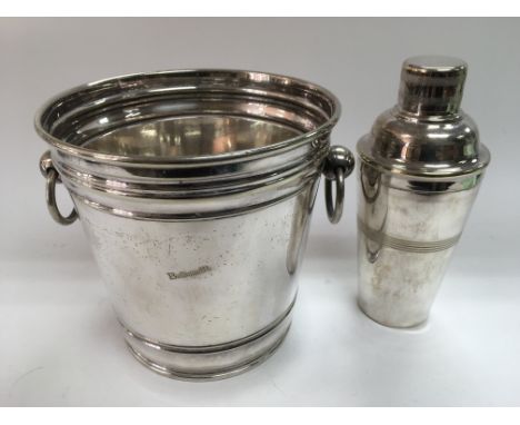 A vintage silver plated cocktail shaker and a silver plated ice bucket (2).