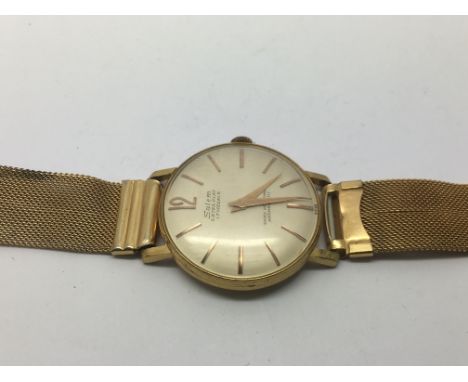 A vintage Salem watch with baton numerals.