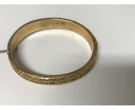 A Chinese gold bangle 24 grams