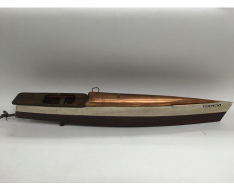 A vintage elastic powered speedboat named Torpedo, approx length 78cm.