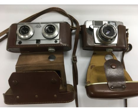 A 1950s Lloca stereo camera and a cased Agfa camera (2).