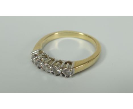 18CT YELLOW GOLD FIVE STONE DIAMOND RING. Total diamond weight 0.30ct (visual estimate), 4.2 grams approximately. Condition R