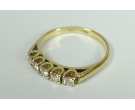 18CT YELLOW GOLD FIVE STONE DIAMOND RING. Total diamond weight 0.30ct (visual estimate), 4.7 grams approximately. Condition R