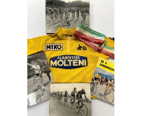 AN HISTORIC 1974 TOUR DE FRANCE WORN YELLOW JERSEY FOR LEGENDARY MOLTENI RIDER EDDY MERCKX TOGETHER WITH AUTOGRAPHS &amp; WIN