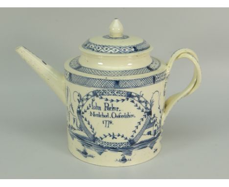 AN EIGHTEENTH CENTURY CREAMWARE OVERSIZE TEAPOT decorated with underglazed blue landscape decoration and inscribed 'John Park