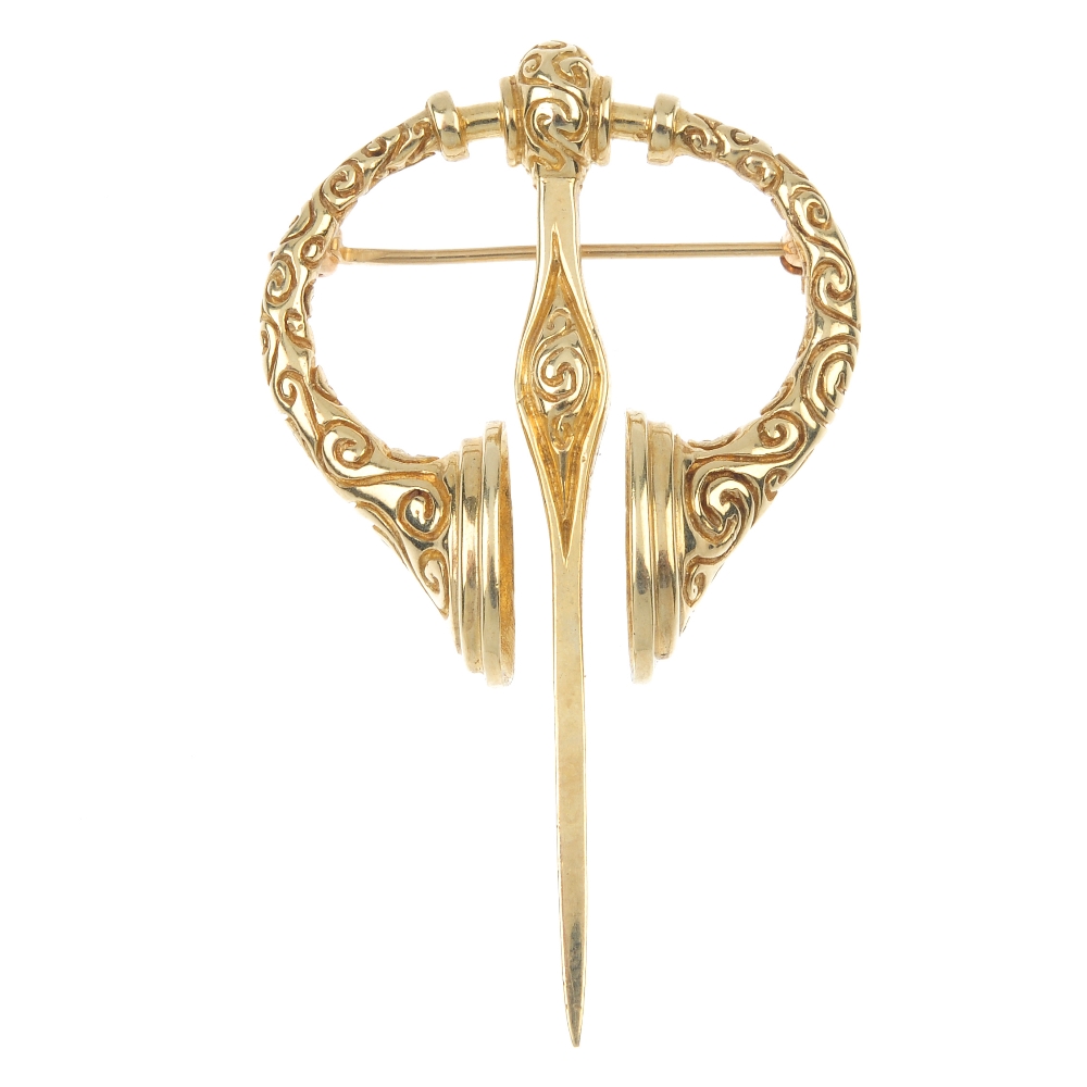 A 9ct Gold Tara Brooch. Designed As A Stylised Version Of The Tara Brooch, With Scrolling Grooved