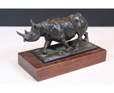 Mark Coreth limited edition bronze resin sculpture of a rhinoceros, with ltd edn No. 47/125, mounted on wooden plinth, signed
