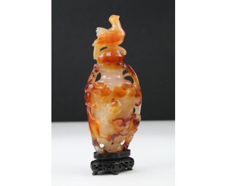 Chinese carved Carnelian Agate figural sculpture with bird to top and raised Chinese detailing, possibly used to be a snuff b