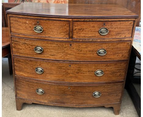 A George III mahogany chest of D shape above two short drawers and three long drawers on splayed bracket feet, 106cm wide x 5