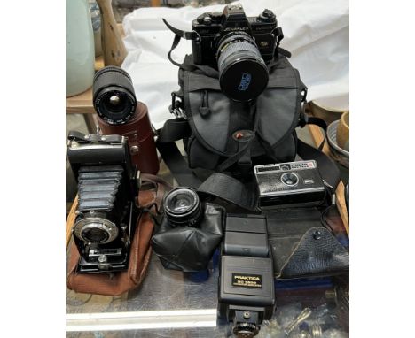 A Jenaflex AM-1 35mm camera together with various lenses, Brownie folding camera etc 