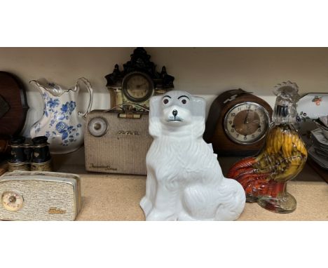 A Staffordshire dog together with a glass pickle cockerel, oak mantle clock, pottery clock, pottery jug, a G.E.C radio, anoth