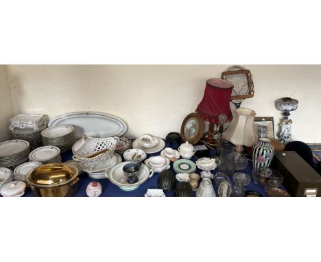 An extensive lot including a gilt decorated part dinner set, tennis racket, hats, oil lamp, other lamps etc 