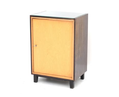 Midcentury Modern A rosewood and beech veneered single door cabinet, the interior with shelf, with glas paned top, with illeg