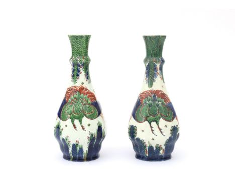 De Porceleyne Fles, Delft Two ceramic vase decorated with birds in blue, green and red on a white ground, both signed with pa