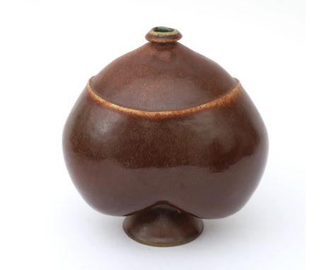 Rolf Overberg (1933-1993) A brown glazed chestnut-shaped stoneware vase on foot, marked underneath. Purchased by the first ow