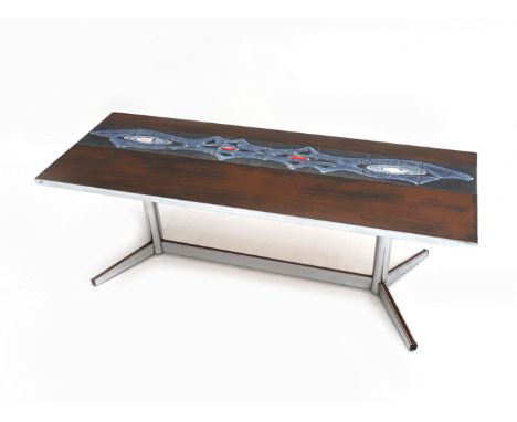 Seventies A rectangular section coffee table, the wood-print laminated top with integrated tiles on chromium plated metal fra