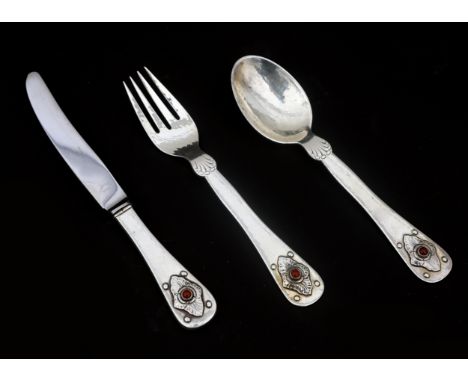 Georg Jensen Sølvsmedie A/S, Denmark A sterling silver place setting with inset cabochon cut stones, comprising a fork, spoon