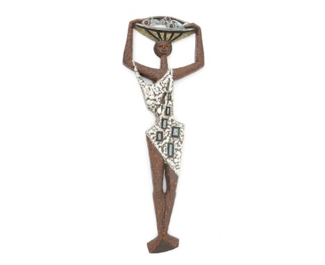 Joop Puntman (1934-2013) A glazed ceramic wall sculpture shaped as a female figure with basket with fish, produced by AMHA (H
