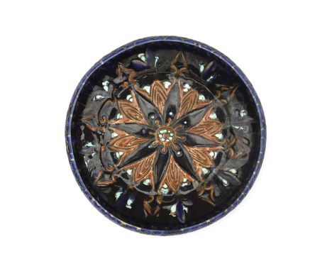 De Distel, Amsterdam An 'incruust' decorated ceramic bowl with flower pattern, designed by Willem van Norden, circa 1910, inc
