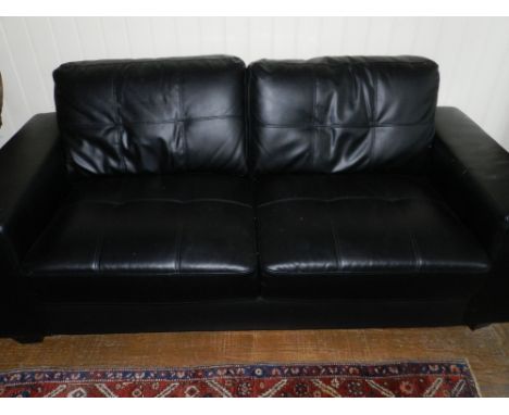 A Contemporary black faux leather two-seater sofa.