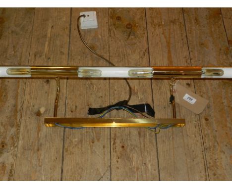 A brass picture light