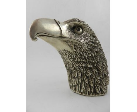 A Chinese white metal study of an eagle's head, bears seal mark to base. H.14.5cm
