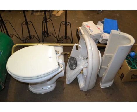 Toilet and cistern with similar wash basin and various hardware